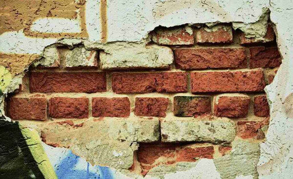 how to fix cracks in plaster walls